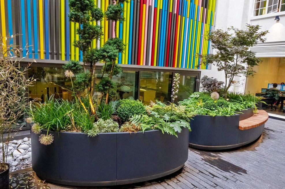 Elsley House, Great Titchfield Street, London Bespoke Steel Planters with Timber Benching